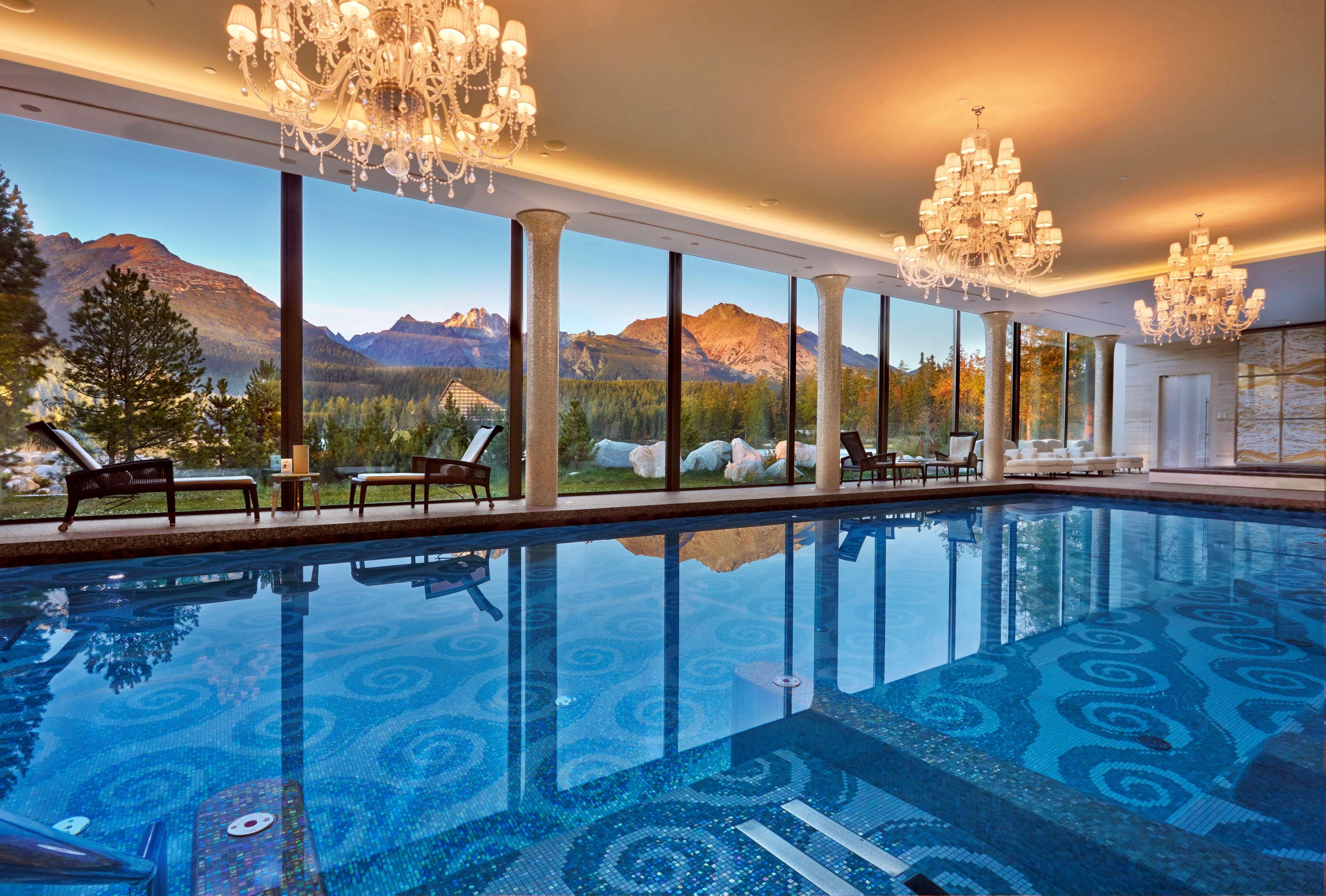 Grand Hotel Kempinski High Tatras Strbske Pleso Bagian luar foto The indoor pool at the St. Moritz Badrutt's Palace Hotel